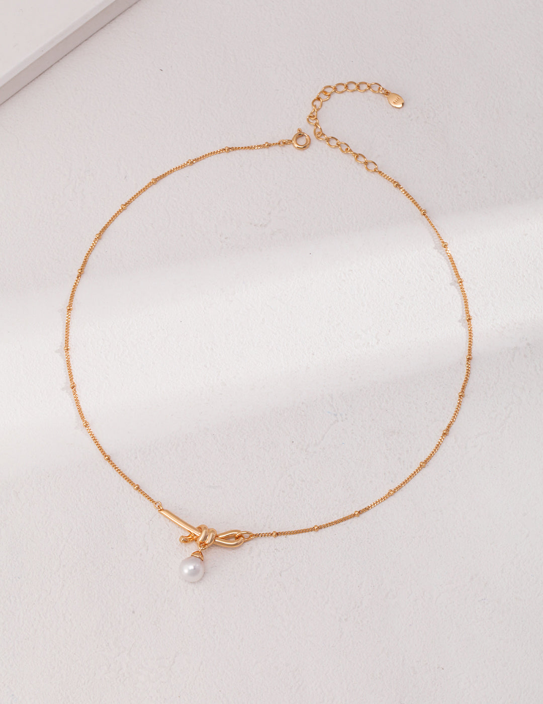 Lumi Pearl Knot Necklace