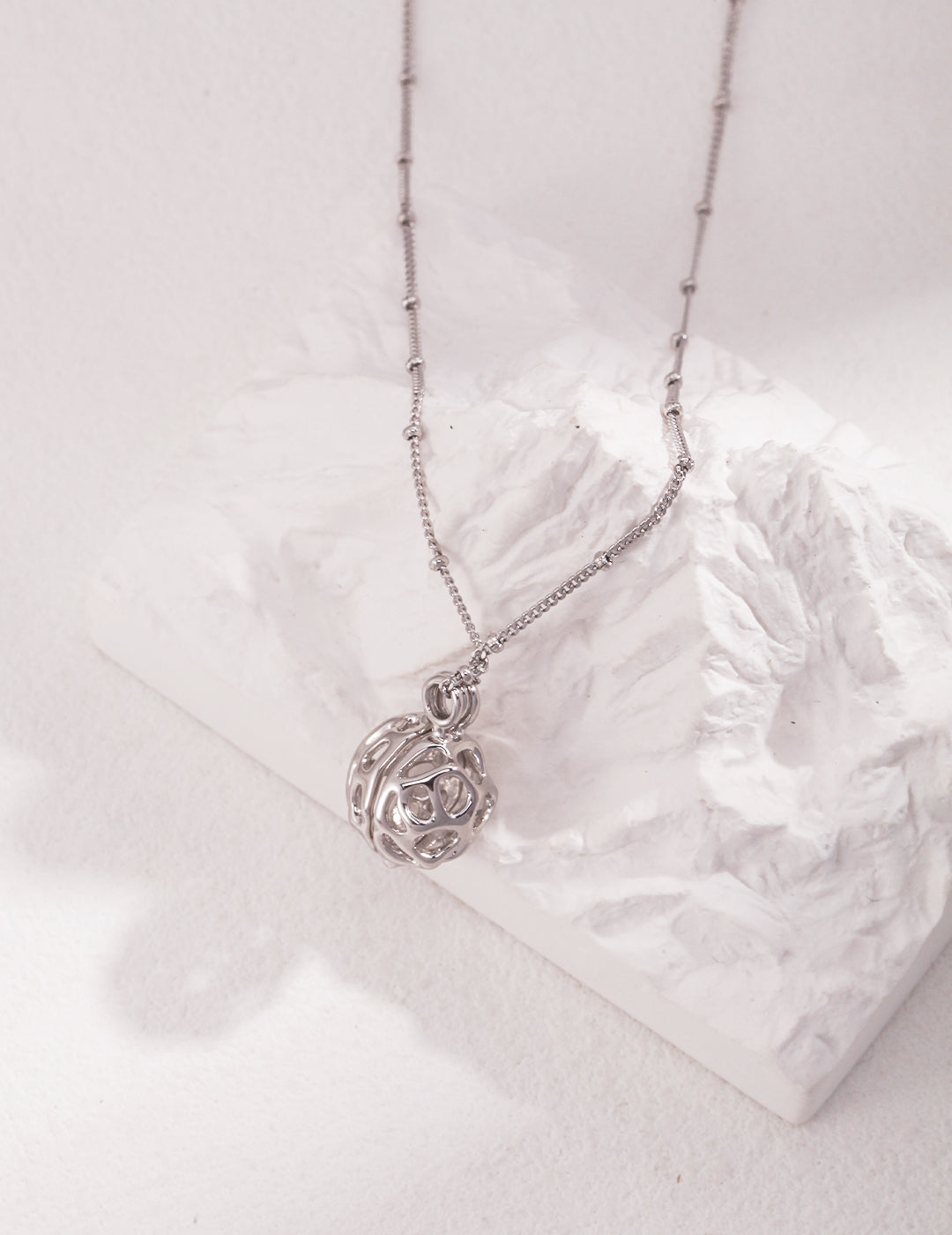 Sculpted Sphere Pendant Necklace