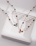Noir Marina Pearl Necklace GOLD AND SILVER